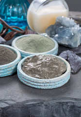 Ancient nature minerals, different types of clay used for skincare, spa treatments, face masks, gray, black, green and blue mud, close up