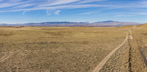 Panorama of dry desert plain during the California drought in central plain. © kenkistler1