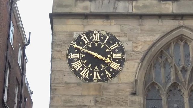 A clock on an old building, York, United Kingdom 