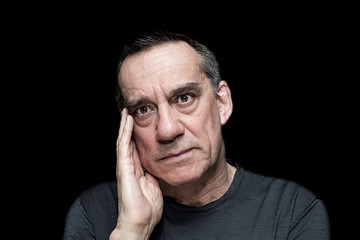 Portrait of Angry Frustrated Man on Black Background