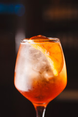 A glass of fresh Aperol Spritz closeup