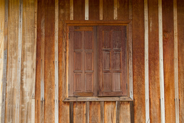 Vintage window detail of old wooden house retro decayed wooden