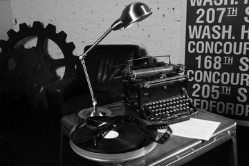 Old typewriter and a coil with a film.