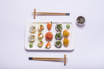 sushi on white table