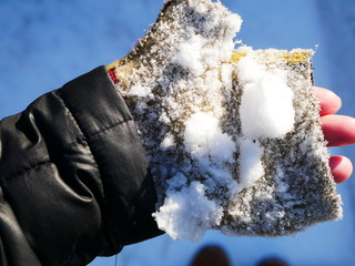Hands in snow