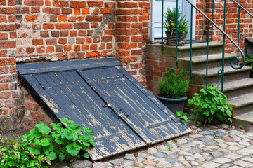antique coal cellar door in Stralsund, Germany