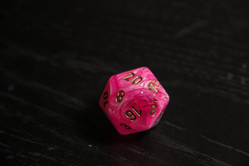 Pink d20