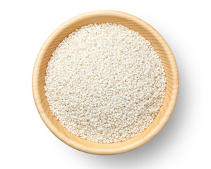 Fototapeta na wymiar White sesame seeds in a wooden bowl, Top view.