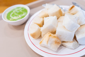 Steam bread with green custard dipping