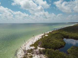 beach aerial drone above view white sand boats sea water island