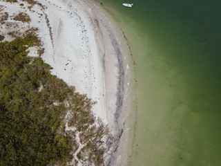 beach aerial drone above view white sand boats sea water island