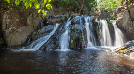 Obraz premium Beautiful cascading waterfall with long exposure
