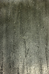 Gray shiny textured acrylic paint with glitter background