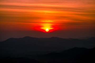 The sun is rising from the mountains, fresh morning. Colorful and memorable