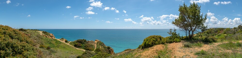 Fototapeta na wymiar Cliffs view by Atlantic Ocean, Lagos, Algarve, Portugal.