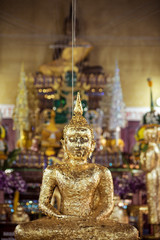 Buddha statue with gold covered