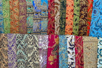 Assortment of colorful sarongs for sale in local market, Island Bali, Indonesia. Close up