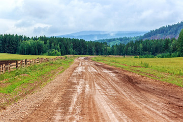 Wet dirt road after little rain.