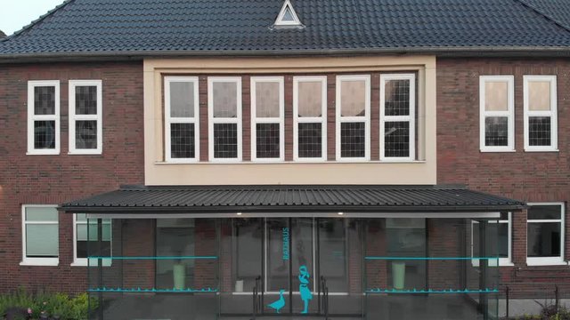Town Hall (Rathaus) Monheim am Rhein, Germany; trucking upwards; 4K UHD