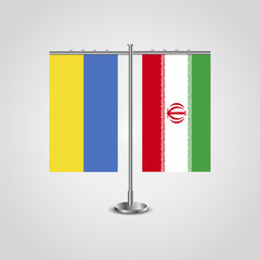 Table stand with flags of Ukraine and Iran.Two flag. Flag pole. Symbolizing the cooperation between the two countries. Table flags