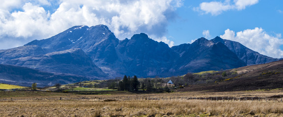 farms in the mountains on the Isle of Skye in the Scottish Highlands