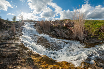 Small waterfall on river