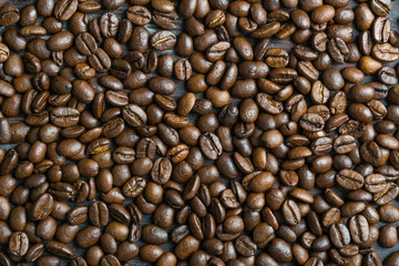 Coffee beans on wooden table
