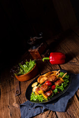 rustic Meatballs skewers of tomato, paprika and baked potato quarters