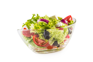 Fresh vegetable salad in bowl isolated on white