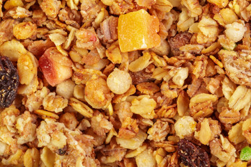 Homemade roasted granola on baking sheet breakfast food background