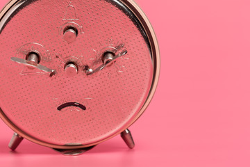 alarm clock on pink background