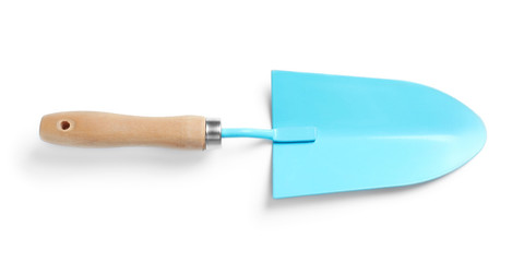 New trowel on white background. Professional gardening tool