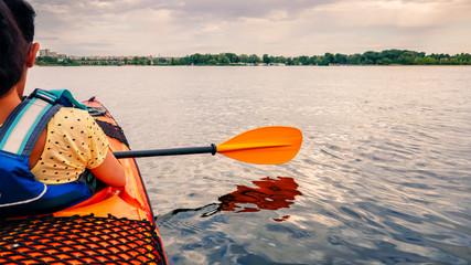 Kayak sails on a beautiful river
