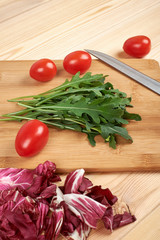 Vegetable and salad set for a healthy dietary lifestyle on a cutting board
