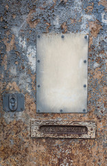 Old painted door with key hole and mail box with signature on Russian - For letters (eng)