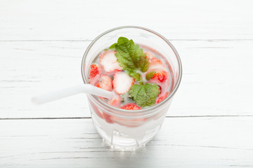 Infused fruit water, strawberry antioxidant diet, detox beverage.