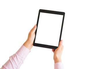 Woman holding tablet vertically in hands with empty white screen.