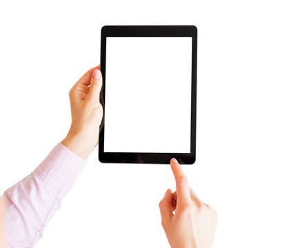Woman holding tablet and touching screen with finger.