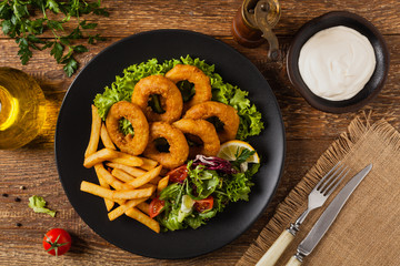 Roasted squid rings with fries