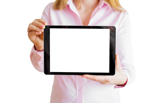 Woman showing tablet with empty screen.