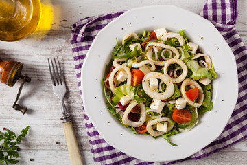 Salad with squid rings.