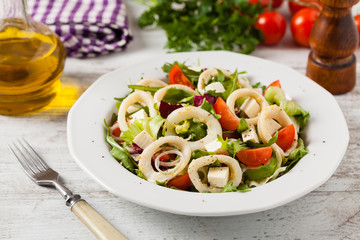 Salad with squid rings.