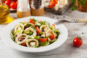 Salad with squid rings.