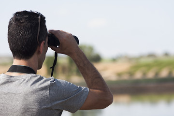 using binoculars