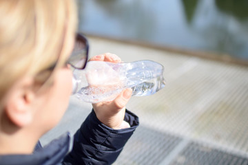 young woman drinking water