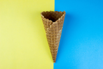 Sweet ice cream cone on color background. Summer minimal concept