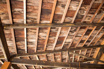 The ceiling is made of wood