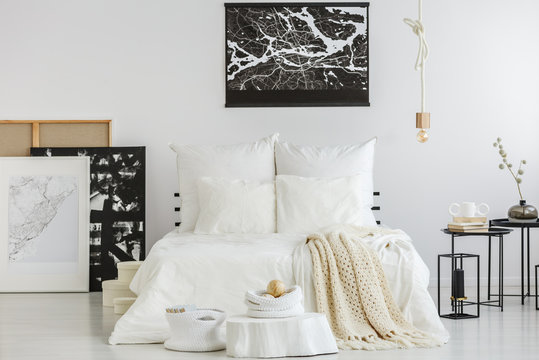 Scandi bedroom with contemporary paintings