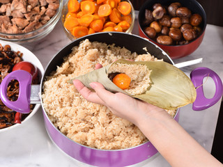 Procedure step of making zongzi or rice dumpling recipe on Dragon Boat Festival, Asian traditional food