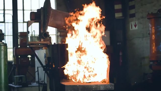 A blaze heating up steel in factory